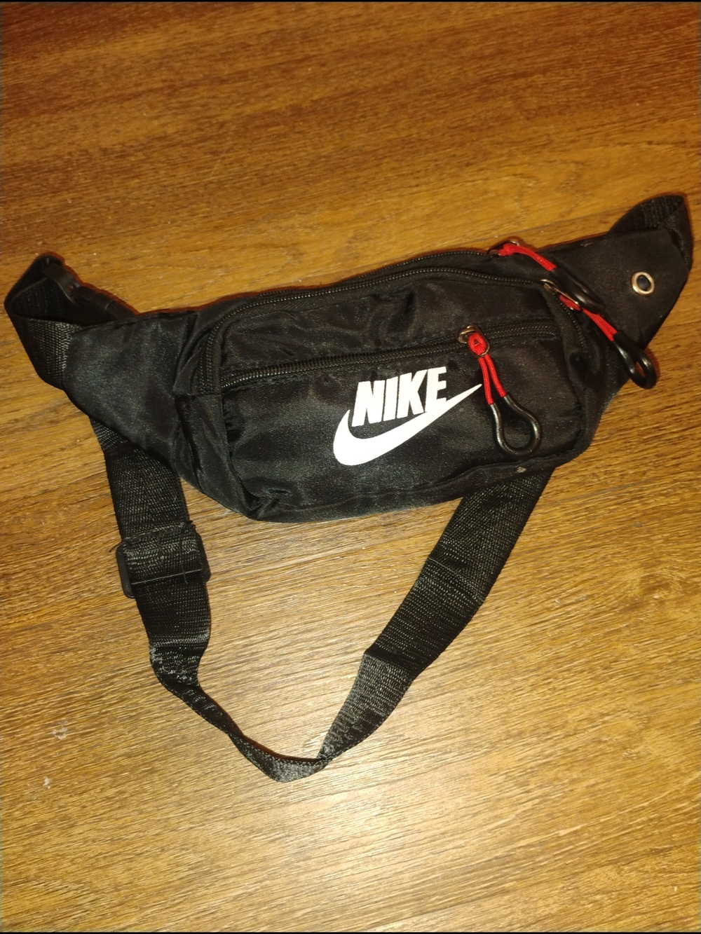 Nike Black Waist Bag with White Swoosh and Red Accents